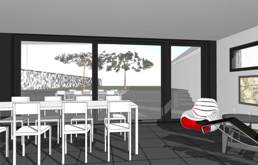 strakke-robuuste-aanbouw-interieur-zicht-naar-tuin-wit-rode-stoel.jpg